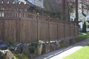 Wood Fence with Top Accent on Retaining Wall