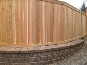 Wood Fence on Curved Retaining Wall